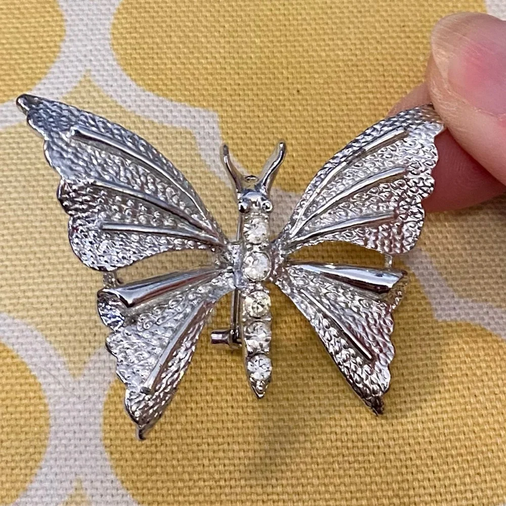 Vintage Signed GERRY’S Silver Tone Textured Butterfly Brooch W Rhinestone Accent